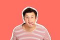Young handsome man joke disagree gesture showing tongue. emotional guy isolated Magazine collage style with trendy color