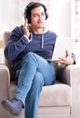 Young handsome man listening to music with headphones Royalty Free Stock Photo