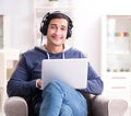 Young handsome man listening to music with headphones Royalty Free Stock Photo