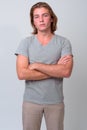 Young handsome man with long blond hair Royalty Free Stock Photo