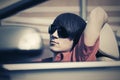 Young man in sunglasses driving convertible car Royalty Free Stock Photo