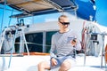 Young and handsome man on a sailing boat Royalty Free Stock Photo