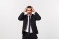 Young handsome man shouting aggressively, looking very angry, frustrated, outraged or annoyed, screaming. Isolated over Royalty Free Stock Photo