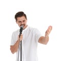 Young handsome man singing in microphone on white Royalty Free Stock Photo