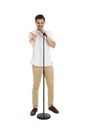 Young handsome man singing in microphone Royalty Free Stock Photo