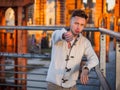 Young man doing thumb down sign, outside Royalty Free Stock Photo