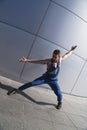 Young handsome man street dancer dancing outdoor Royalty Free Stock Photo