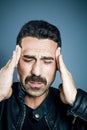 Young handsome man suffering from headache Royalty Free Stock Photo