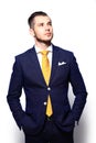 Young handsome man in suit looking at copy-space thinking Royalty Free Stock Photo