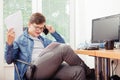 Man talking on phone and looking at document Royalty Free Stock Photo