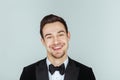 Young handsome man in a tuxedo, looking at the camera Royalty Free Stock Photo