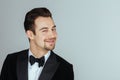 Young handsome man in a tuxedo, looking at the camera Royalty Free Stock Photo