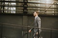 Young handsome man walking by office building Royalty Free Stock Photo