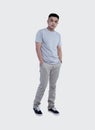 Young handsome man was posing wearing heather grey t-shirt short sleeve with mockup concept Royalty Free Stock Photo