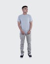 Young handsome man was posing wearing heather grey t-shirt short sleeve with mockup concept Royalty Free Stock Photo