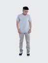 Young handsome man was posing wearing heather grey t-shirt short sleeve with mockup concept Royalty Free Stock Photo