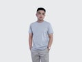 Handsome man wearing heather grey t-shirt short sleeve with mockup concept Royalty Free Stock Photo