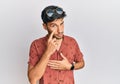 Young handsome man wearing casual summer clothes pointing to the eye watching you gesture, suspicious expression Royalty Free Stock Photo