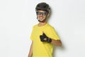 Young handsome man wearing cyclist helmet showing a thumbs up ok gesture isolated on white background