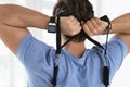 Young man during workout with a resistance bands in the gym Royalty Free Stock Photo