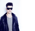 Young handsome modern man in sunglasses like robot, lifestyle fa Royalty Free Stock Photo