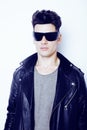 Young handsome modern man in sunglasses like robot, lifestyle fashion style people concept Royalty Free Stock Photo