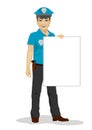 Young handsome policeman holding blank board over white background