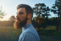 Young handsome serious bearded man