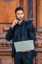 Young Handsome Serious East Indian American Businessman with beard working in New York Royalty Free Stock Photo