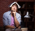 Young handsome student preparing for exams at night Royalty Free Stock Photo