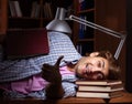 Young handsome student preparing for exams at night Royalty Free Stock Photo