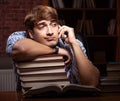 Young handsome student preparing for exams at night Royalty Free Stock Photo