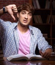 Young handsome student preparing for exams at night Royalty Free Stock Photo