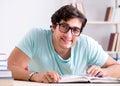 Young handsome student preparing for school exams Royalty Free Stock Photo