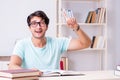 The young handsome student preparing for school exams Royalty Free Stock Photo