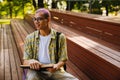 Young handsome stylish smiling boy in glasses looking aside Royalty Free Stock Photo