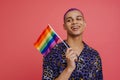 Young handsome stylish smiling happy boy holding LGBT flag Royalty Free Stock Photo