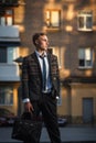 Young handsome successful stylish businessman standing Royalty Free Stock Photo