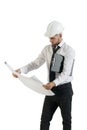 Young handsome technician working with drawing plans on white Royalty Free Stock Photo