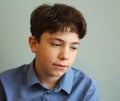 Young handsome teenage boy close up thinking portrait Royalty Free Stock Photo