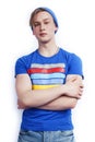 young handsome teenage hipster guy in hat posing emotional, happy smiling against white background isolated, lifestyle Royalty Free Stock Photo