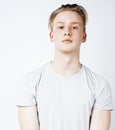Young handsome teenage hipster guy posing emotional, happy smiling against white background isolated, lifestyle people Royalty Free Stock Photo
