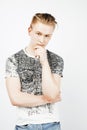 Young handsome teenage hipster guy posing emotional, happy smiling against white background isolated, lifestyle people Royalty Free Stock Photo