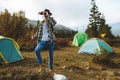 Young handsome tourist camping outdoors and looking through binoculars Royalty Free Stock Photo