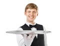 Young handsome waiter holding empty tray Royalty Free Stock Photo