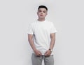 Young handsome wearing white t shirt short sleeve isolated on background