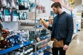 Young handyman or DIY homeowner in a store Royalty Free Stock Photo