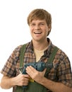 Young handyman holding power drill Royalty Free Stock Photo