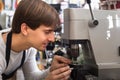 Young handyman making door keys copies Royalty Free Stock Photo