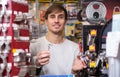 Young handyman making door keys copies Royalty Free Stock Photo